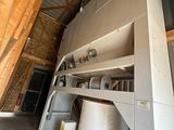a machine that is sitting inside of a building