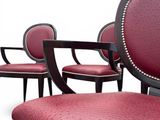 four chairs that are sitting next to each other