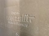 a metal container that has a logo on it