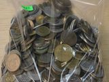 a bag full of coins sitting on a table