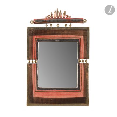 a picture of a mirror that is hanging on the wall