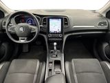 a picture of the interior of a car with a touch screen