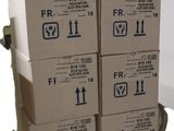 several boxes stacked on top of each other on a carton