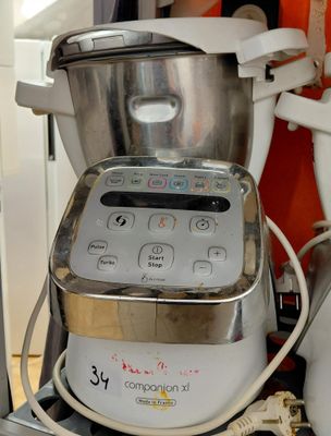 a blender sitting on top of a counter next to a blender