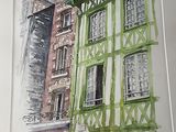 a picture of a painting of a building on the wall