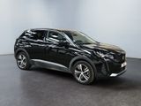 the black suv is parked in a large room with a black floor