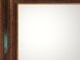 an old wooden frame with a mirror on the wall
