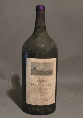 a bottle of wine that is sitting on a table