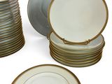 a lot of plates that are stacked on top of each other