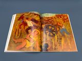 an open book with a picture of a man and a woman