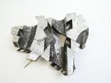 a piece of metal that has been cut into pieces