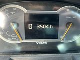 a close up of a car ' s dashboard with a speedometer