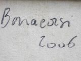 graffiti on the wall of a building with writing on it
