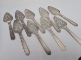five spoons and six spoons on a table