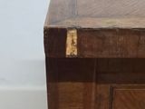 a close up view of a wooden desk with a drawer
