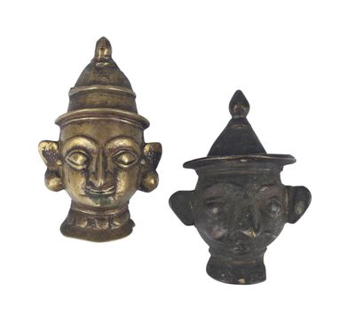 pair of antique brass figurines of a man and a woman ' s head