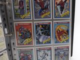 a picture of a binder with a bunch of comics on it