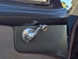 a close up of a door handle on a car