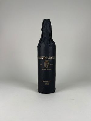 the bottle of wine is sitting on the table ready to be filled