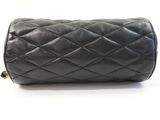 chanel black quilted leather cosmetic case