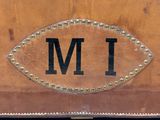 a brown suitcase with the word i m on it