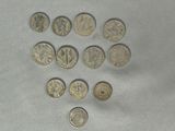 a lot of coins that are sitting on a table