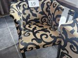 two chairs and a table with a price tag on it