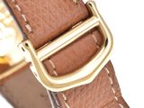 brown leather watch strap with gold buckle on a white background