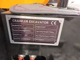 a picture of a crawler excavator that is on display