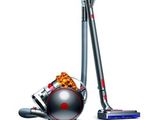un gros plan d'un aspirateur et d'un aspirateur à sac