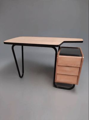 an image of a desk with a drawer and a drawer underneath it