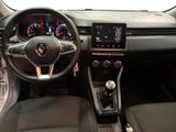 a picture of the interior of a car with a steering wheel and dashboard