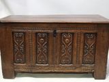 an old wooden chest with carvings and carvings on it