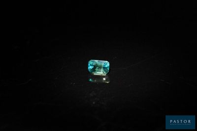 an emerald stone in the dark