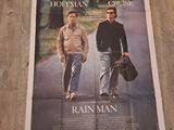 une affiche représentant deux hommes marchant dans la rue