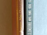 two books that are sitting next to each other on a table