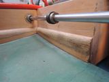a close up of a machine that is working on a piece of wood