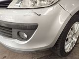 a close up of a car that has a denting on it
