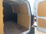 a white van with the door open and the back door open