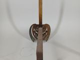 an image of a wooden and metal object on a white surface
