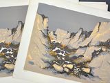 trois reproductions d'un tableau représentant une montagne, réalisé à la peinture dorée et noire