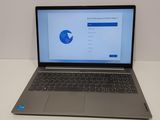 the laptop is sitting on the table with the screen open