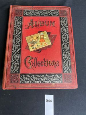 a red book with a picture of a girl and a boy on it