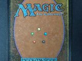a close up of the back of a card with a picture of a circle on it