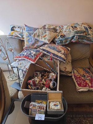 a couch with a lot of stuff on it