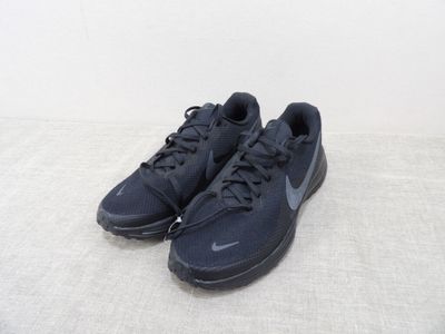 the nike air max sneakers are black and have black laces