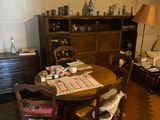 a dining room with a table and chairs in it