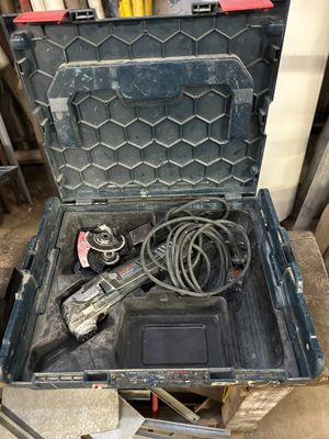 a tool in a tool box that is sitting on the floor