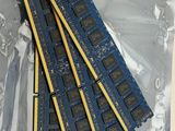 four memory modules are sitting on top of each other in a plastic bag