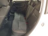 the back seats of a car are empty and the passenger seat is empty